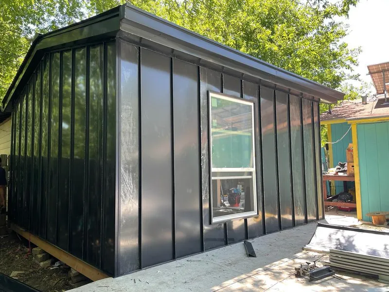 Black standing seam metal wall panels for Roof Inspection in Sedona